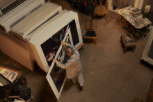 Henson’s studio houses antique statuary and books, as well as his large-scale archived photographs draped in plastic.