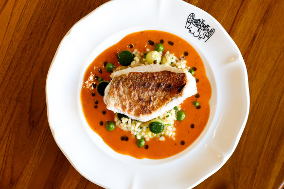 Crisp-skinned red mullet on sauce Americaine with fregola.