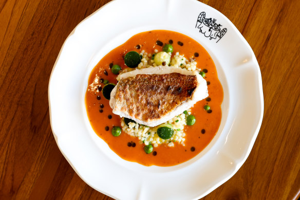 Crisp-skinned red mullet on sauce Americaine with fregola.