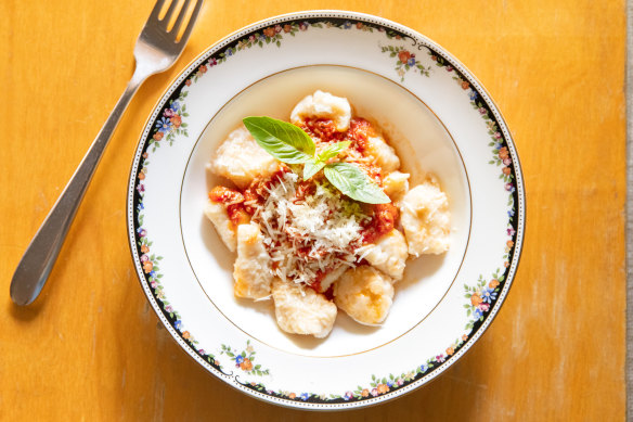 Putting the potatoes through a ricer ensures lump-free gnocchi.