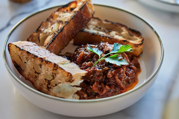Caponata of eggplant, tomato, sultanas and pine nuts.