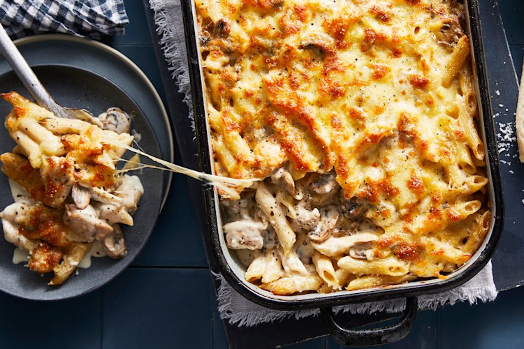 This chicken and mushroom pasta bake is all about the silky-smooth Alfredo sauce.