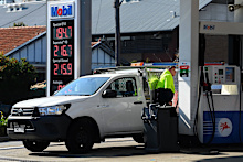 Customers fill their vehicles at the 7 Eleven Mobil petrol station on Liverpool Road in Ashfield, NSW. September 29, 2023.