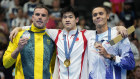 Gold medalist Pan Zhanle of China, Kyle Chalmers and bronze medalist David Popovici of Romania following the men’s 100 metre freestyle final.