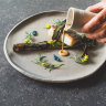 Pan-fried murray cod, charred leek and shellfish cream at Muse Restaurant.