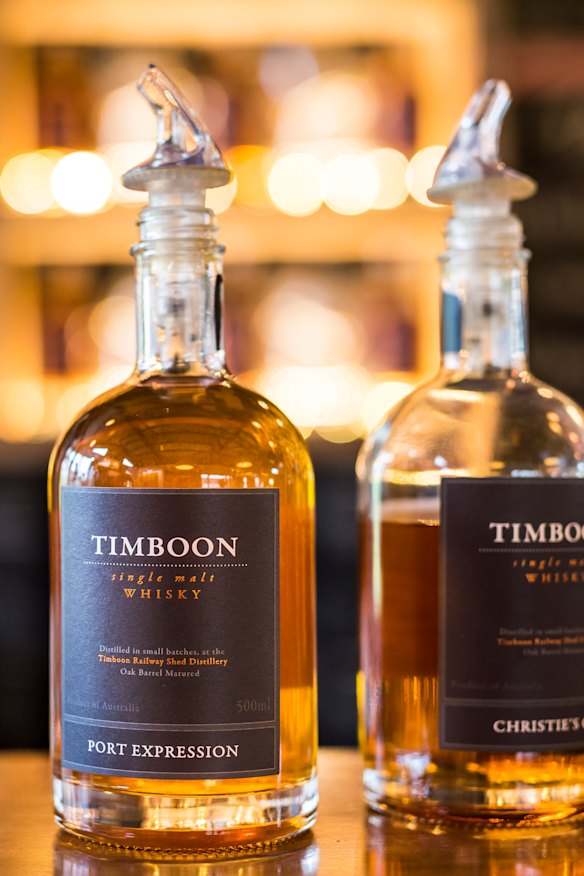 There are 185 bottles lining the walls.