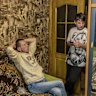 Anatolii Prokhorenko and his father Volodymyr Poltoratskyi in their relatives’ apartment in the regional capital, two hours south of their village.