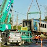 A train carriage is removed from the tracks after derailing in Clifton Hill.