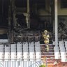 A firefighter at the scene of the blaze at Caulfield Racecourse on Tuesday.