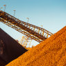 Surging iron ore price boosts BHP, Rio in 'championship quarter' for miners