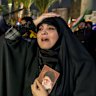 Mourners attend a memorial vigil for Ayatollah Ali Khamenei.