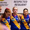 Beaumaris players gather in the changerooms before their memorial game honouring Holly and Bianca. 