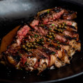 Dry-aged Dandaragan beef sirloin with green pepper and brandy sauce.