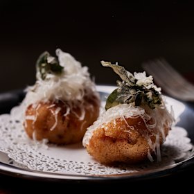 Jamon serrano croquettes with lemon and green garlic aioli.