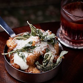 Champagne fried chicken with blue cheese and bourbon dip.