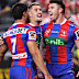 Newcastle Knights’ Bradman Best, right, is congratulated by teammates Dylan Brown, left, and Dylan Lucas.