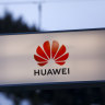 US charges China's Huawei with bank fraud, stealing trade secrets