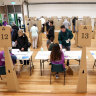 Voters cast ballots at a polling station during a federal election in Sydney on Saturday.