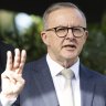 Labor promises $7.4b in extra spending, but also more cuts in budget