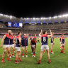 PERTH, AUSTRALIA - MAY 15: The Demons celebrate after the teams win during the 2022 AFL Round 09 match between the West Coast Eagles and the Melbourne Demons at Optus Stadium on May 15, 2022 in Perth, Australia. (Photo by Will Russell/AFL Photos via Getty Images)