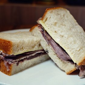 Wagyu roast beef, horseradish mayo, pickles and cheddar sandwich.