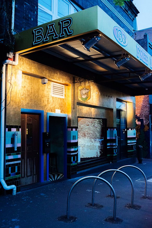 Outside the Redfern bar.