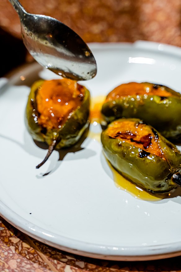 Jalapeno stuffed with fresh pork sausage and queso oaxaca.