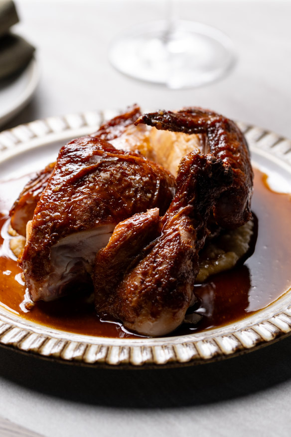 Half a free-range chicken with white corn puree.