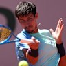 PARIS, FRANCE - MAY 30: Alexei Popyrin of Australia plays a forehand against Nuno Borges of Portugal during the Men’s Singles Third Round match on Day Six of the 2025 French Open at Roland Garros on May 30, 2025 in Paris, France. (Photo by Adam Pretty/Getty Images)