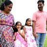 Tharnicaa Nadesalingam (2nd left) arrives for her fifth birthday party with her parents Priya and Nades and sister Kopika after their safe return to Biloela.
