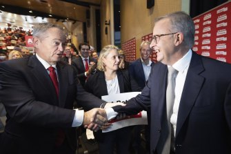 Anthony Albanese is greeted by his predecessor Bill Shorten at a campaign stop in Melbourne.