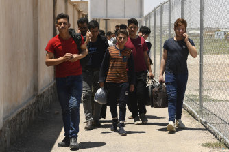 Unaccompanied minors arrive at Zero Point on the Afghanistan-Iran border.