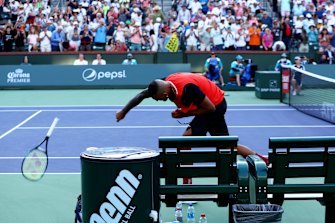 Nick Kyrgios smashes his racquet during his match against Rafael Nadal
