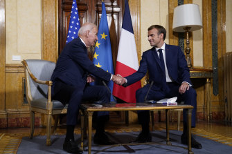 Psaki was last around US President Joe Biden (pictured here meeting with French President Emmanuel Macron in Rome) on Tuesday.