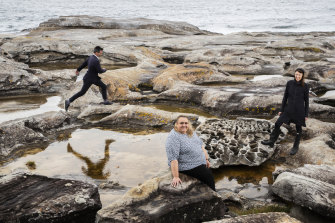 Architect Stephen Neille, local elder Noeleen Timbery, chair of the La Perouse Aboriginal Land Council,  and architect Rachel Neeson on a rock platform at Kurnell.