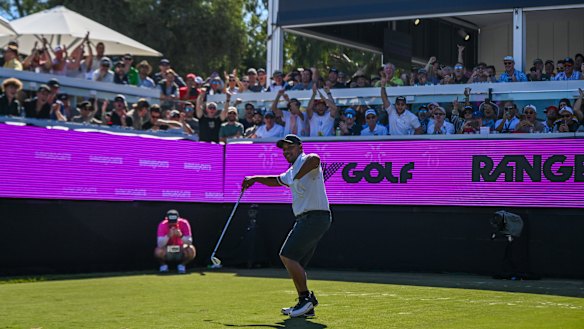 Harold Varner III dances on the party hole.