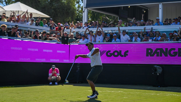 Harold Varner III dances on the party hole.