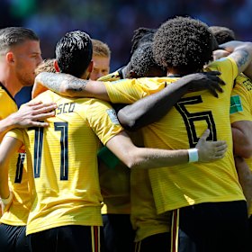 Belgium's players celebrate a goal during their 5-2 win over Tunisia.