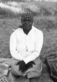 Emily Kam Kngwarray near Alice Springs after the first exhibition of Utopia batiks, 1980.