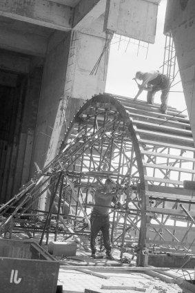 Workers rigging the scaffolding for the archway at the main entrance of the NGV, 1967.
