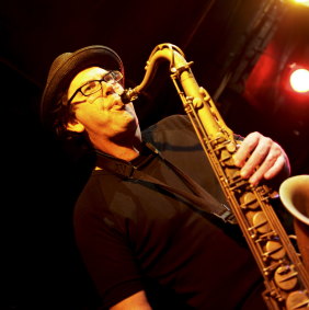 Playing jazz saxophone in 2009.