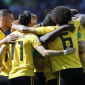 Belgium's players celebrate a goal during their 5-2 win over Tunisia.
