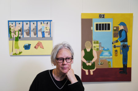 Art curator Elizabeth Day with some of the artwork created by inmates at Long Bay Correctional Complex.