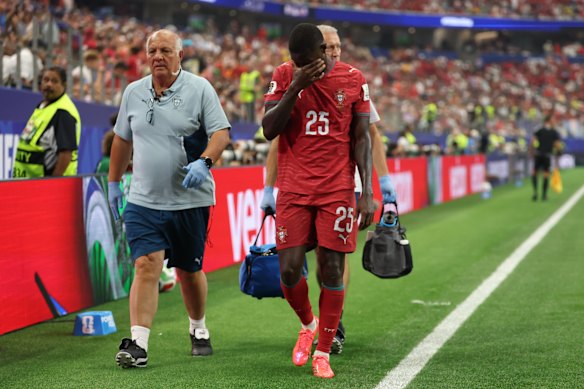 Nuno Mendes leaves the pitch injured.