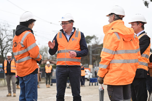 Premier Daniel Andrews during a tour of a level crossing removal site in Croydon on Wednesday.
