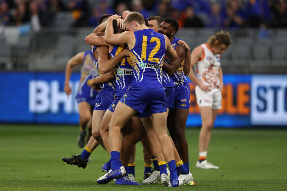 Brendon Ah Chee and his Eagles teammates celebrate a goal in the 12-point win over GWS.