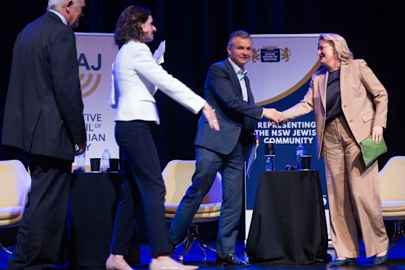 Wentworth’s Allegra Spender (in white), Kingsford Smith MP Matt Thistlethwaite and Liberal candidate for Wentworth Ro Knox.
