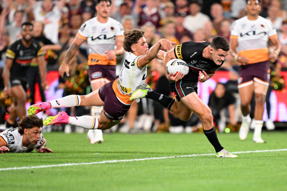 Nathan Cleary cruises past Reece Walsh to score the match-winning try.