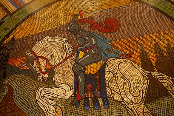 A knight rides on a horse in this mosaic by the Melocco Brothers. 