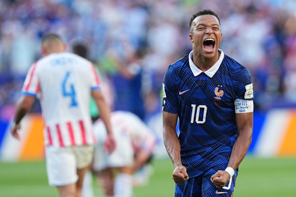 Mbappe celebrates.